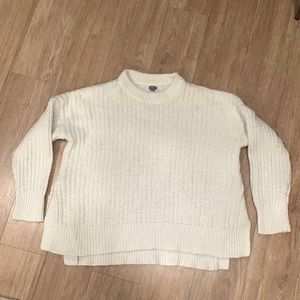 White aerie sweater, slits on sides. Small stain shown in last photo.